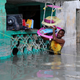 A resident evacuates furniture after rain water flooded his home in Mogadishu, Somalia May 21, 2018.